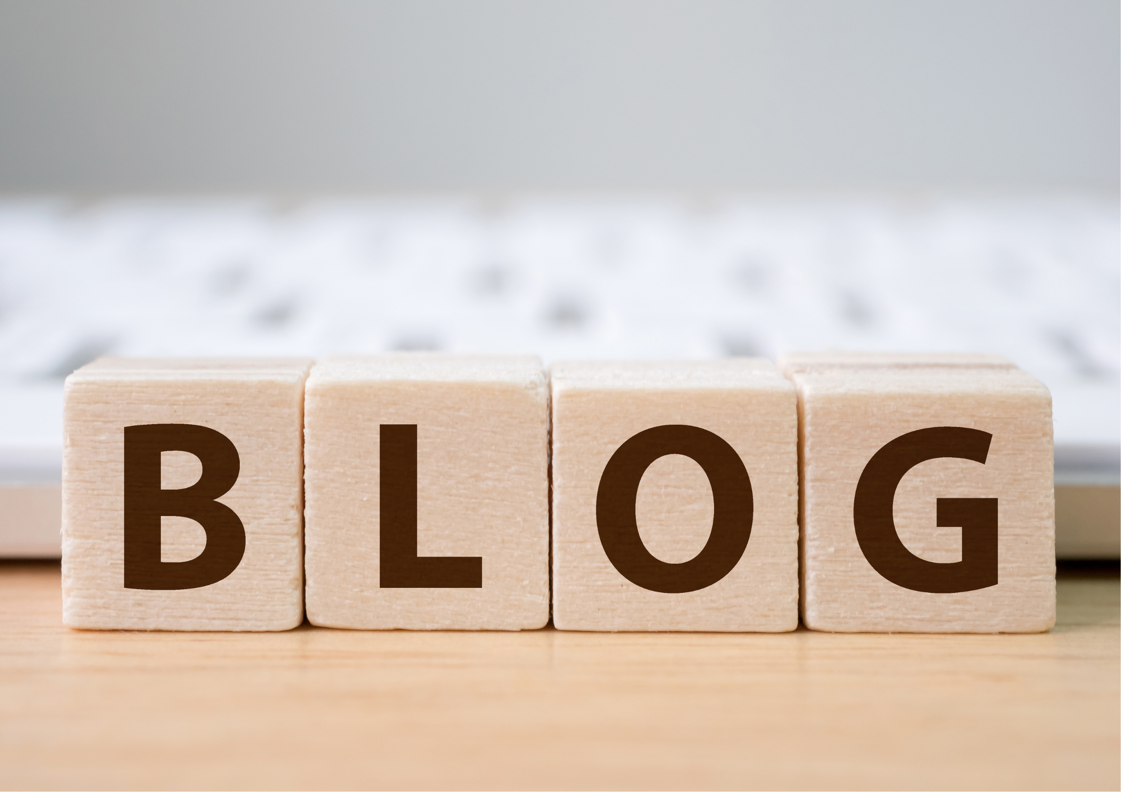 decorative design with the word blog displayed on wooden cubes